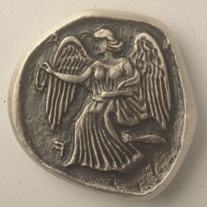 Pièce-de-monnaie-victoire-olympique